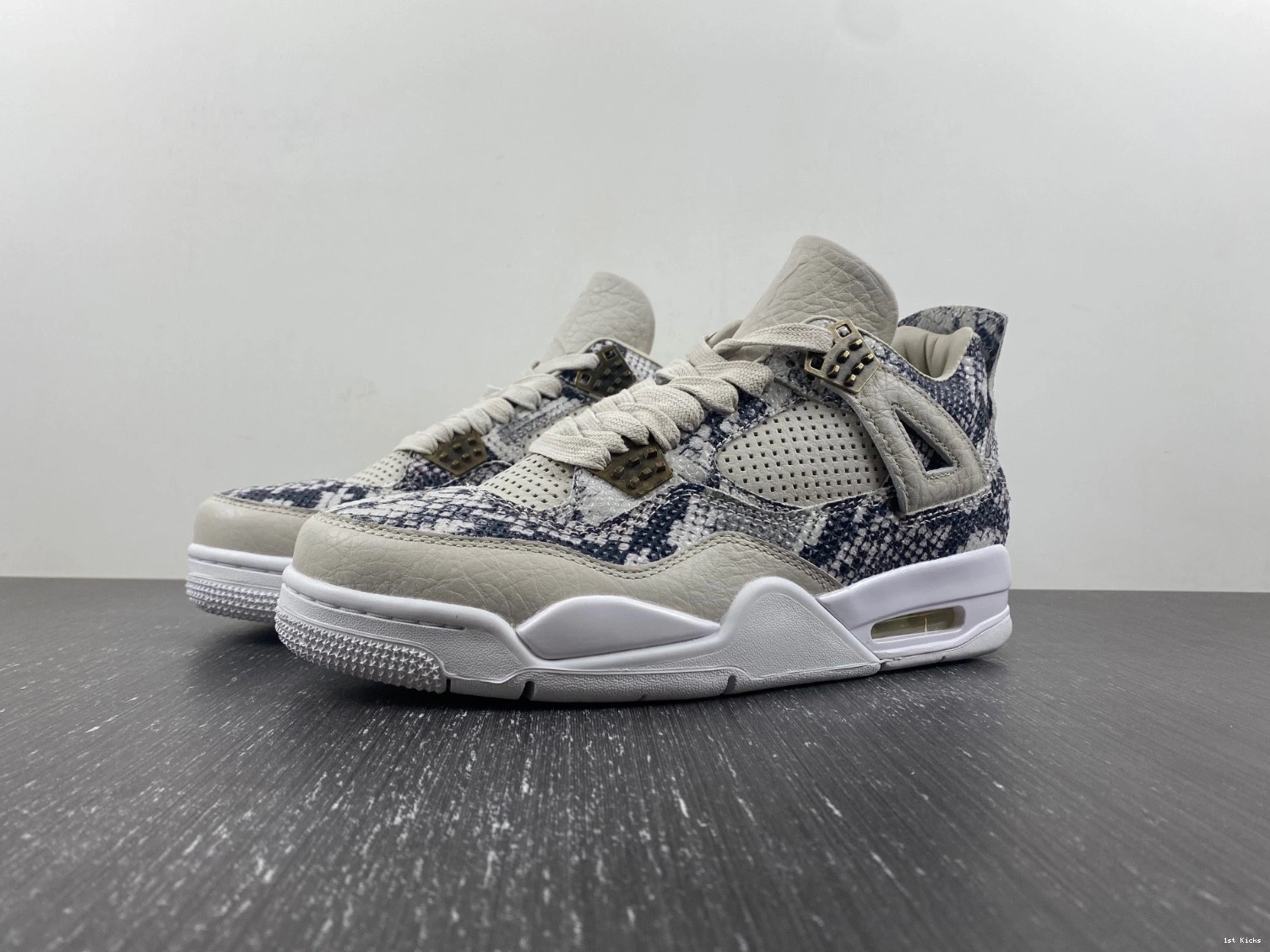 - 819139-030 Retro Snakeskin Jordan 4 1225